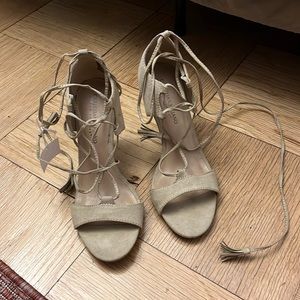 Tan strappy heels. UNWORN